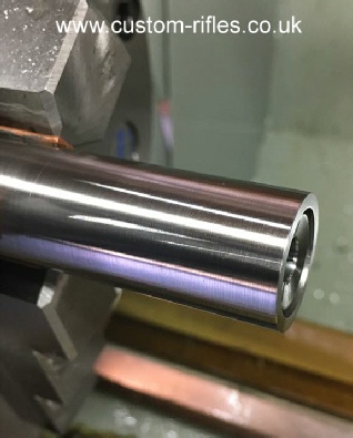 Invisible barrel thread protector.
